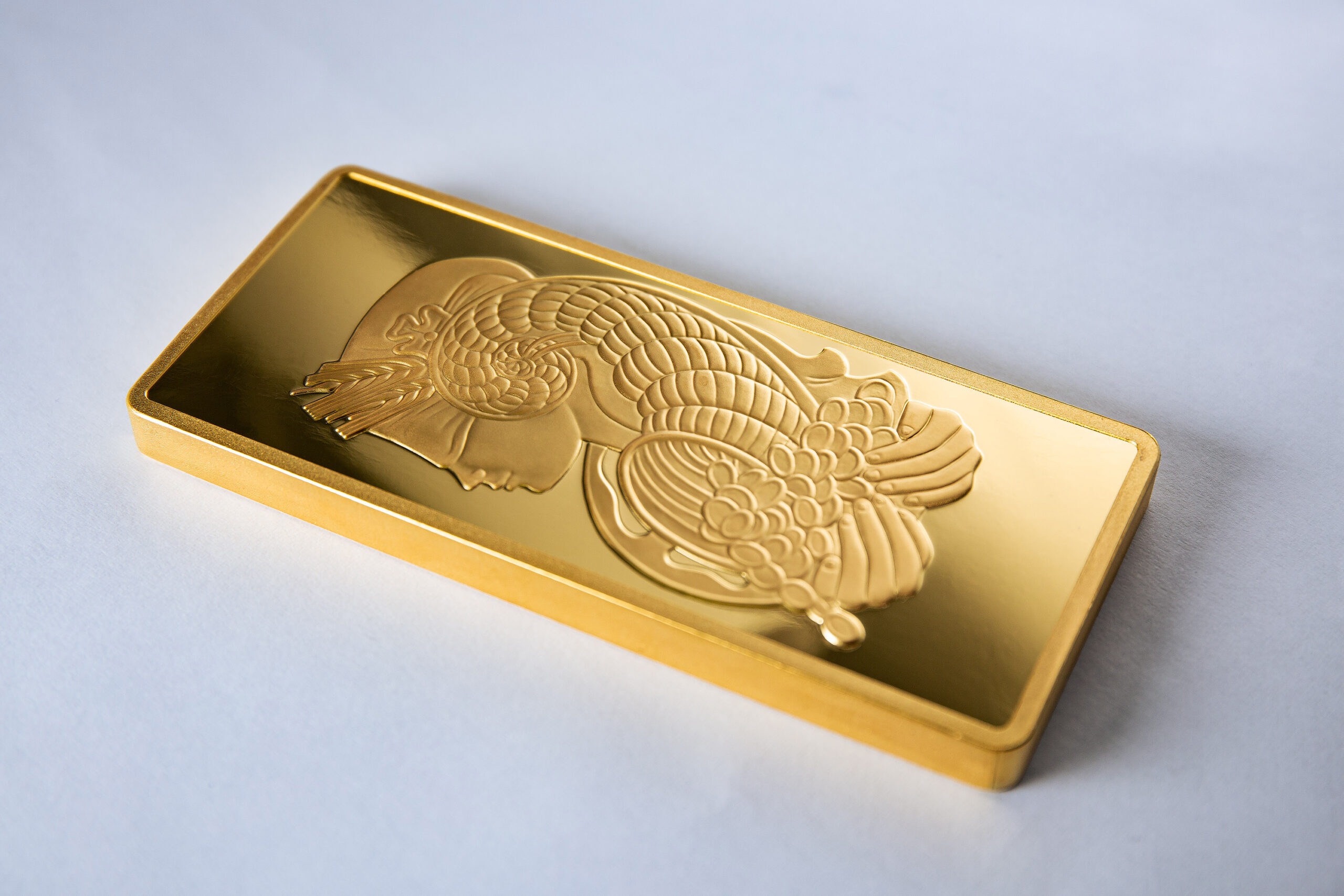 Closeup of a PAMP minted gold bar with Lady Fortuna design